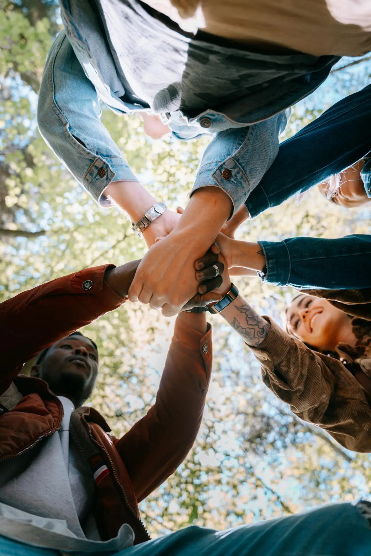 friends hands in circle,