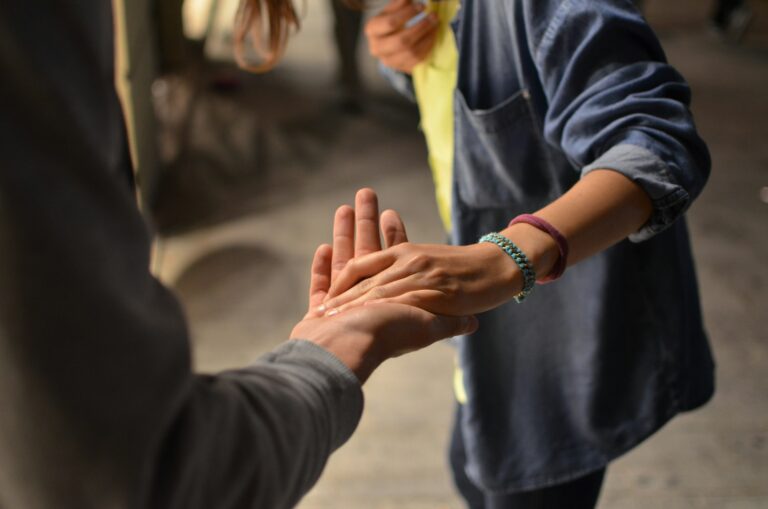 Person offering a hand in support