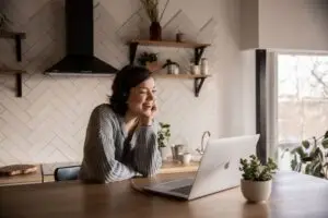 A woman at home in a virtual IOP session
