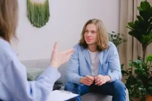 A man speaking to a therapist