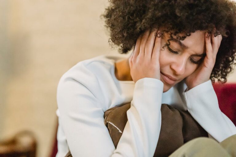 Stressed woman dealing with pain