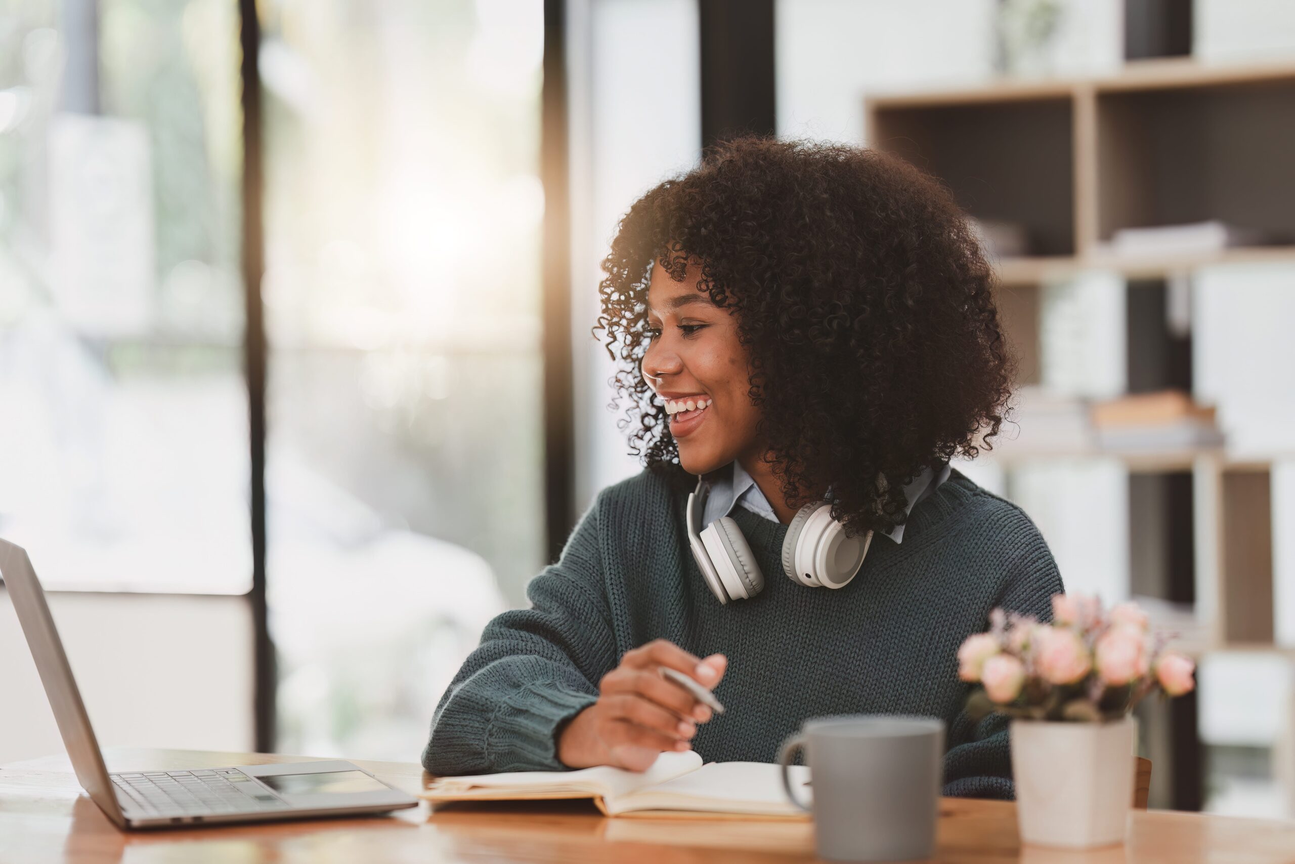 woman participating in virtual IOP online mental health group from home